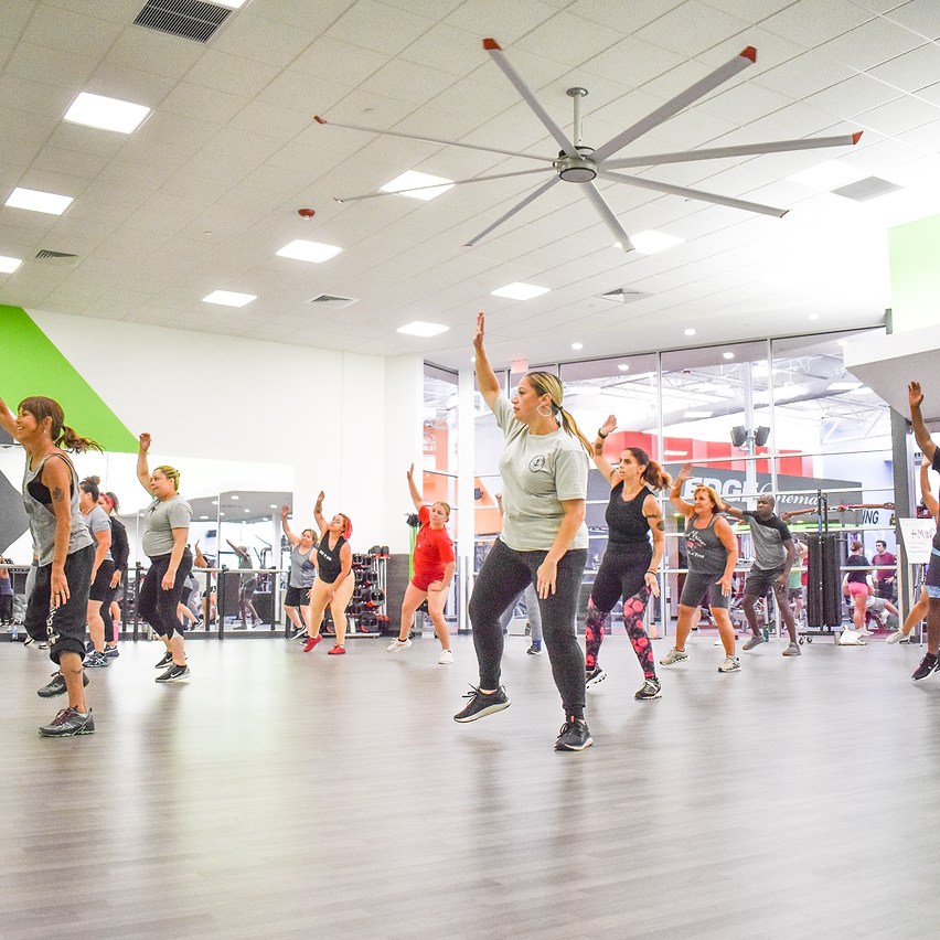 Group of people working out together.