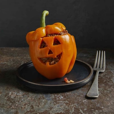 jack-o-lantern stuffed peppers