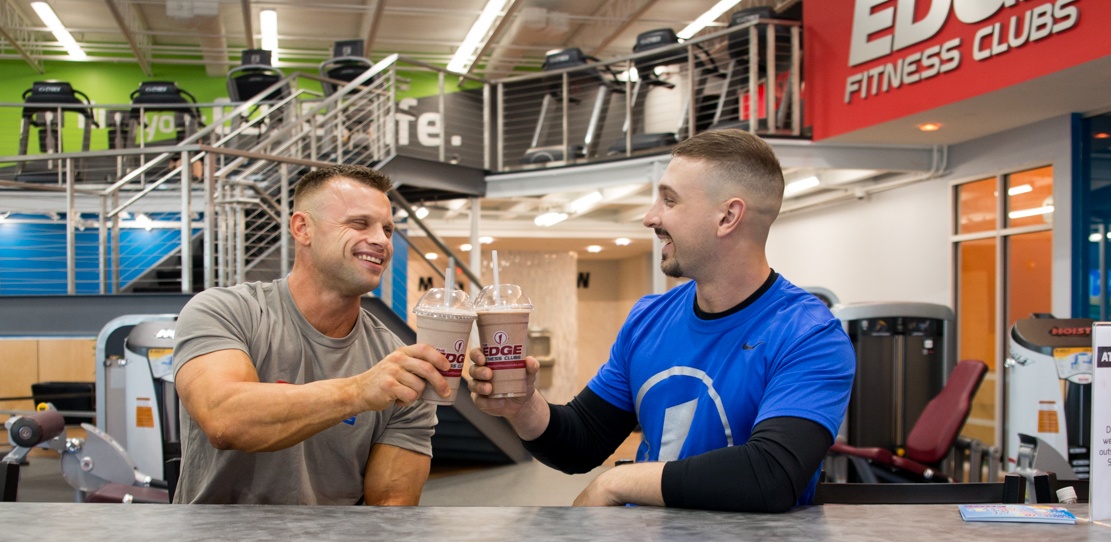 Two guys having shakes.